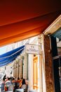 Street cafe with bright marquise