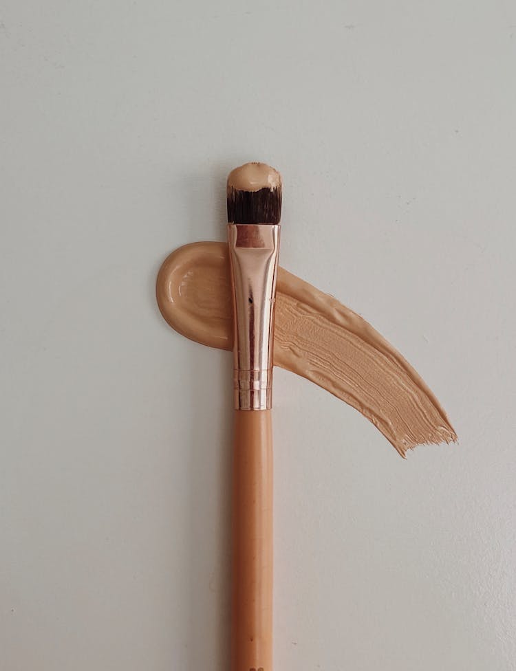 Makeup Brush On Tone Cream Smear On White Background