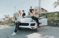 Men Posing with a Car