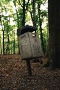 Photo of a Rubbish Bin in a Forest