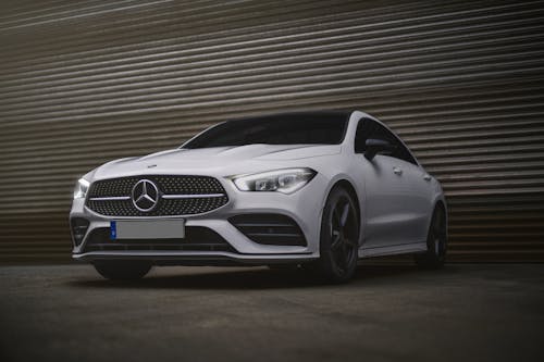 Free  Mercedes Benz Coupe on Gray Asphalt Road Stock Photo