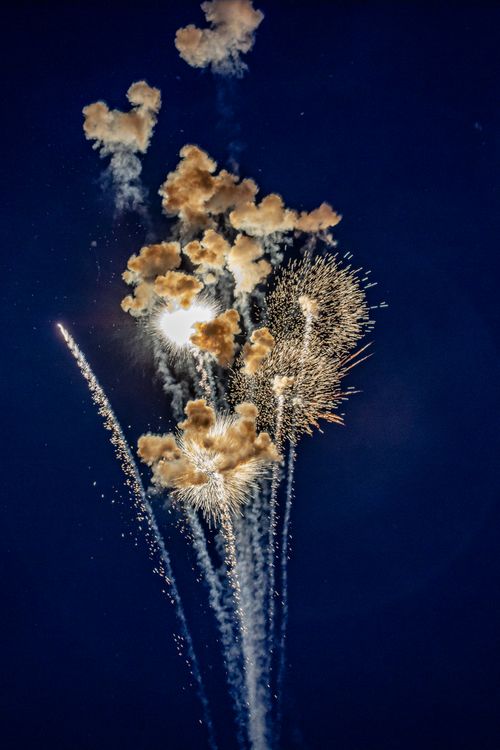 Free Stunning fireworks illuminate the night sky in a vibrant and celebratory display. Stock Photo