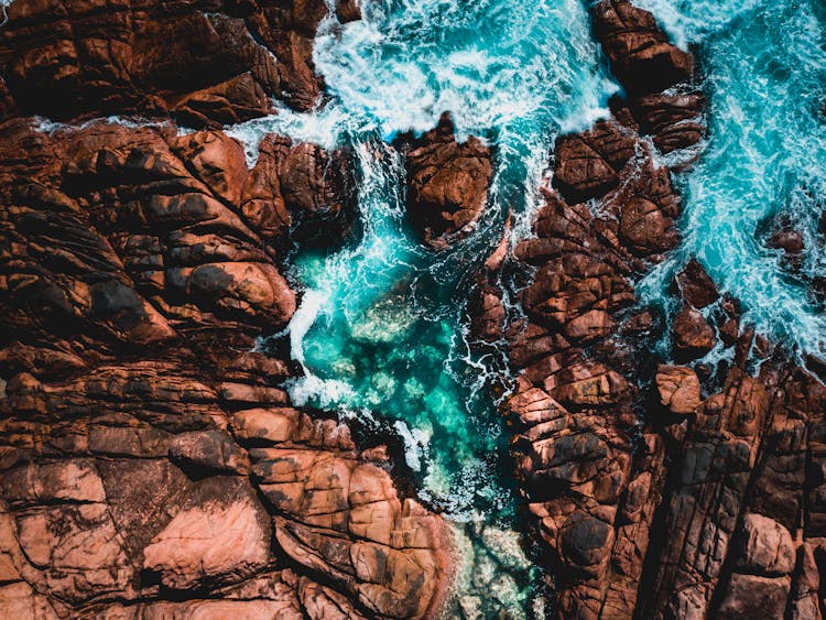 Ocean Waves Crashing On Rocks