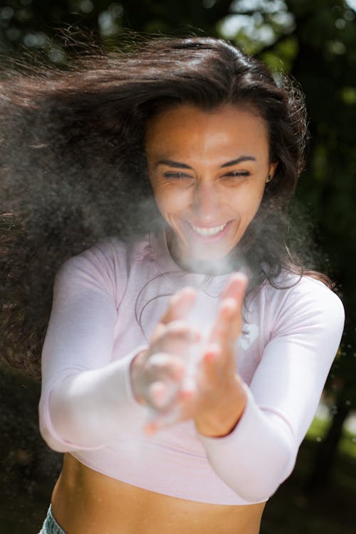 Free Woman in White Activewear Smiling  Stock Photo