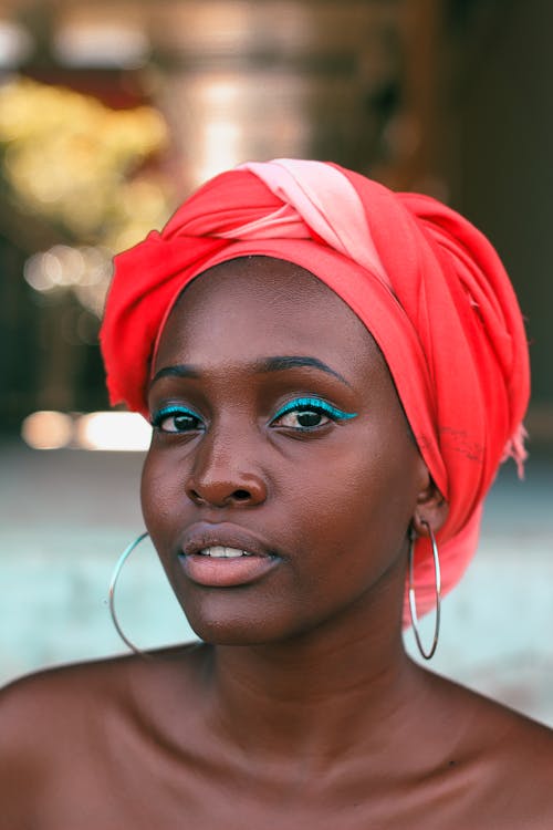 Woman Wearing Red Turban With Eye Make up