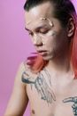 Woman With Black and Blue Dragon Tattoo on Her Face