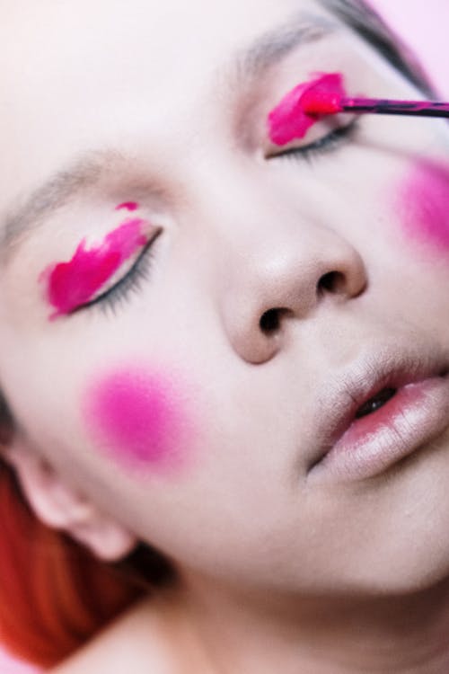 Woman With Pink and Green Lipstick