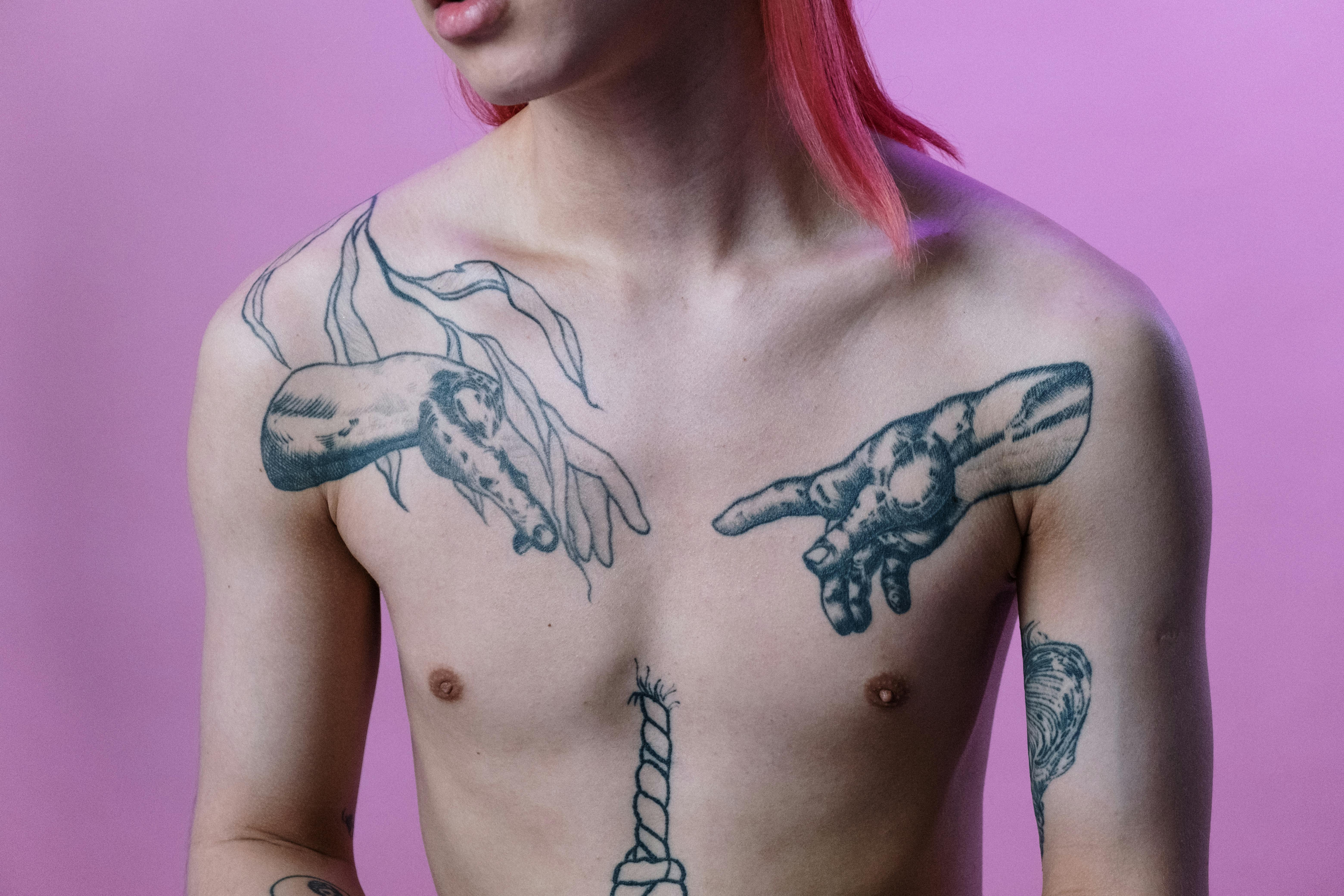 Stylish Black Man with Intricate Tattoos | MUSE AI