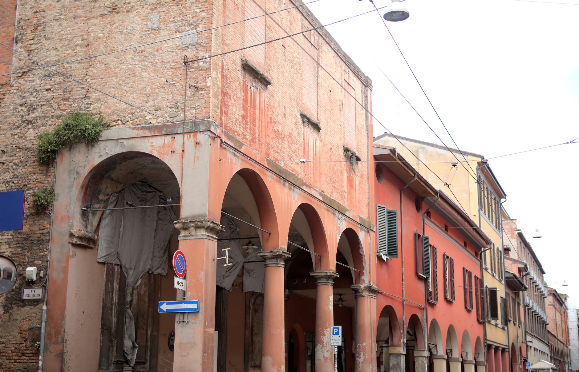 Discover the vibrant and rustic architecture of an old European town with colorful facades.