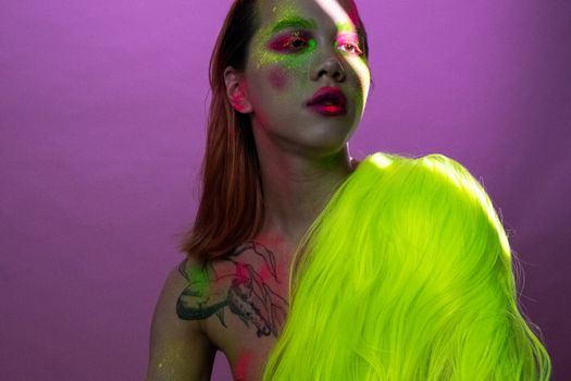 Woman With Green Hair and Green Eyes