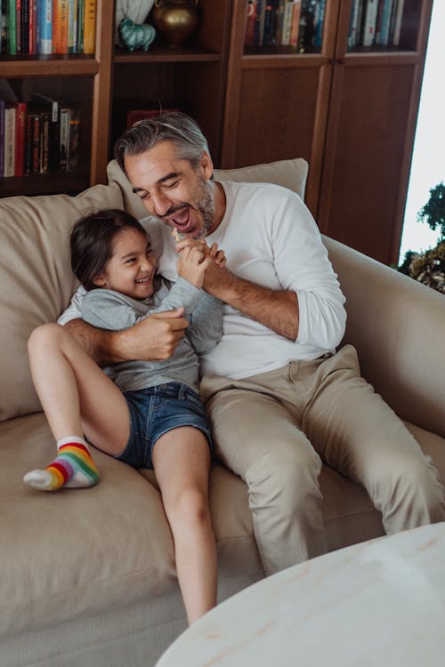 Father with Daughter on a Sofa