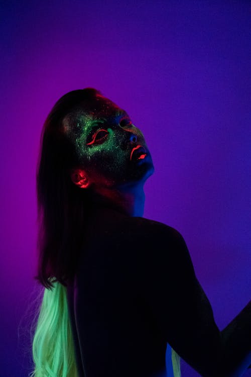 Woman With Face Paint Wearing Black Shirt