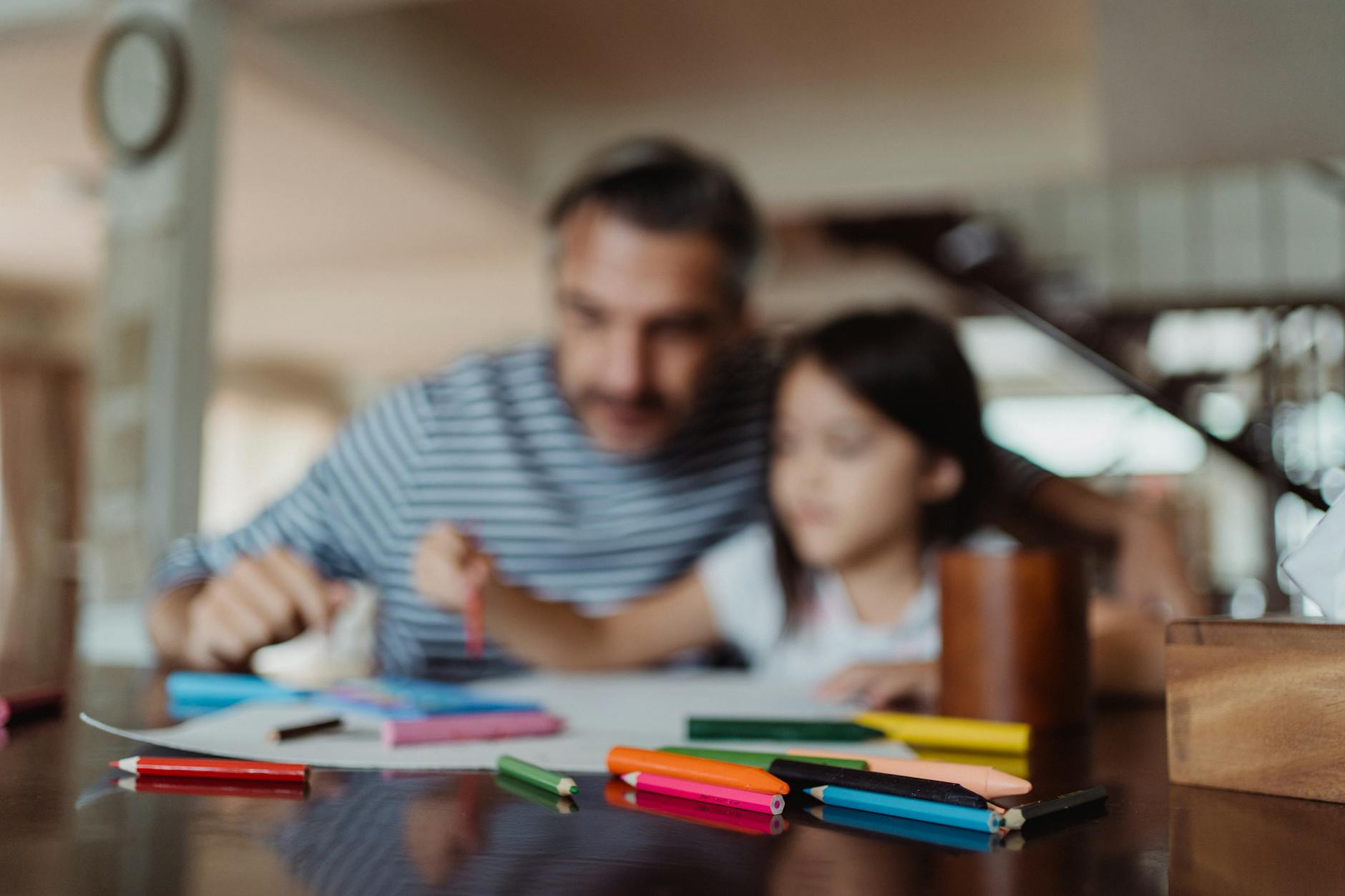 Colored Pencils on Wooden Table