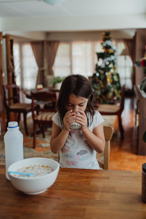 A Girl Eating Breakfast