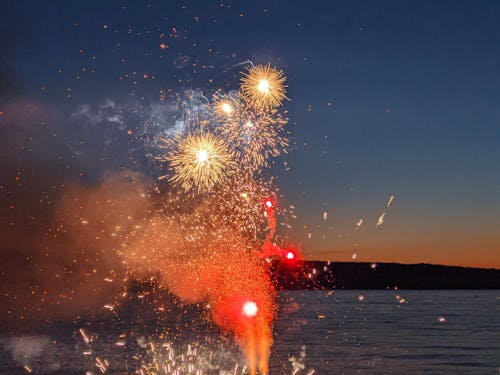 Free stock photo of fireworks, hill, lake Stock Photo