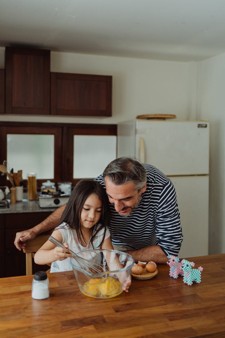 Father And Daughter Cooking