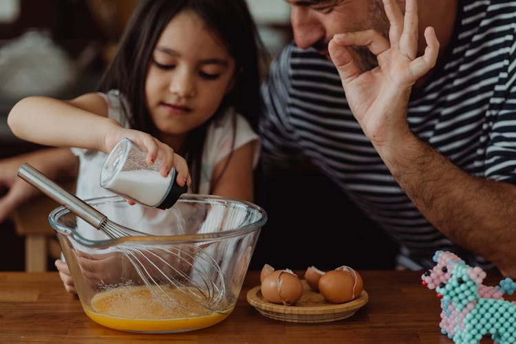 Father Teaching Daughter Baking