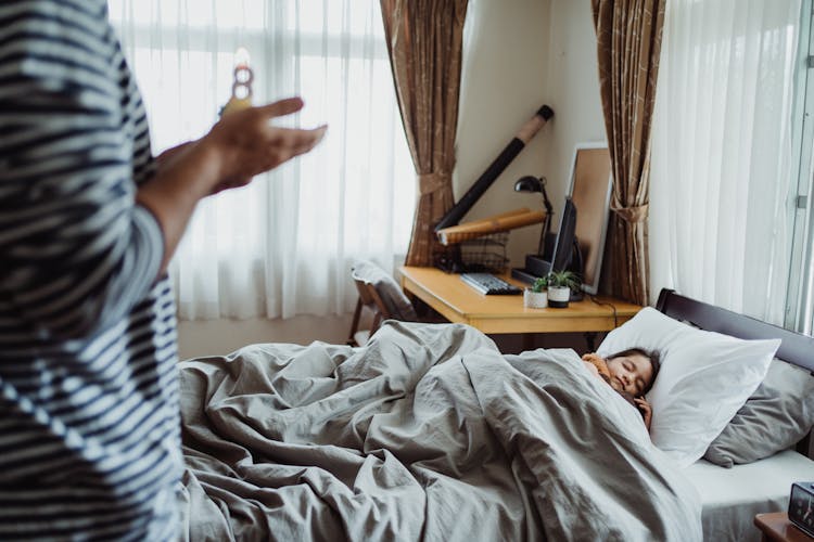 Father Waking Up Sleeping Daughter