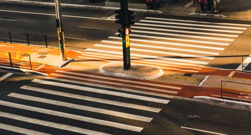 Free High angle shot of a zebra crossing and traffic lights at a São Paulo intersection in warm daylight. Stock Photo