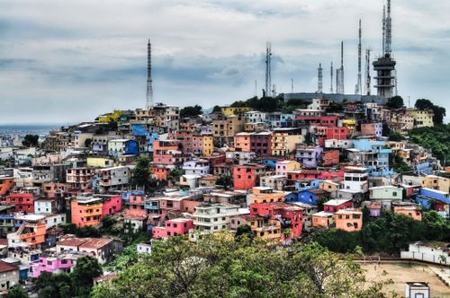 Free Colorful homes on Santa Ana Hill in Guayaquil, Ecuador under a dramatic sky. Stock Photo