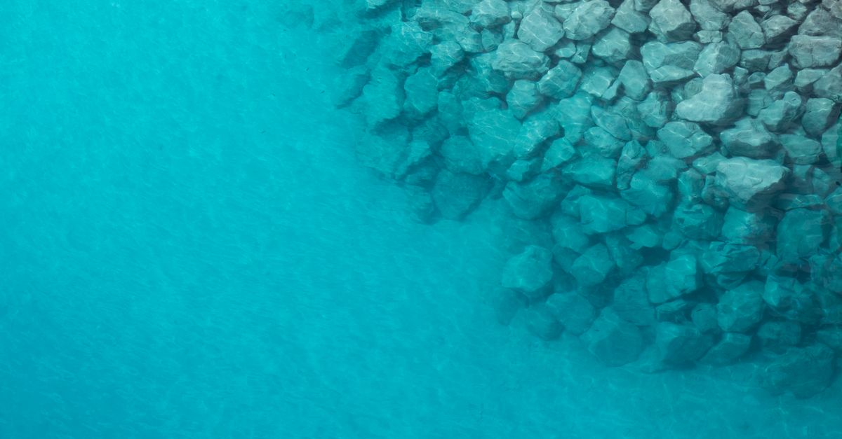 Turquoise Bahamian sea and sandy cays from above