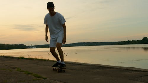 Photo of Man riding a Skateboard