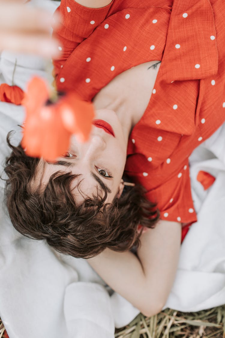 Woman In Red Polka Dot Top