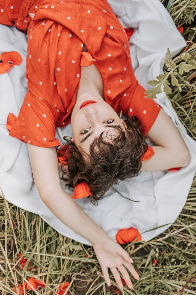 High Angle Shot Of A Woman Lying Down