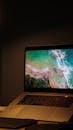 A Macbook Laptop with Ocean Wallpaper