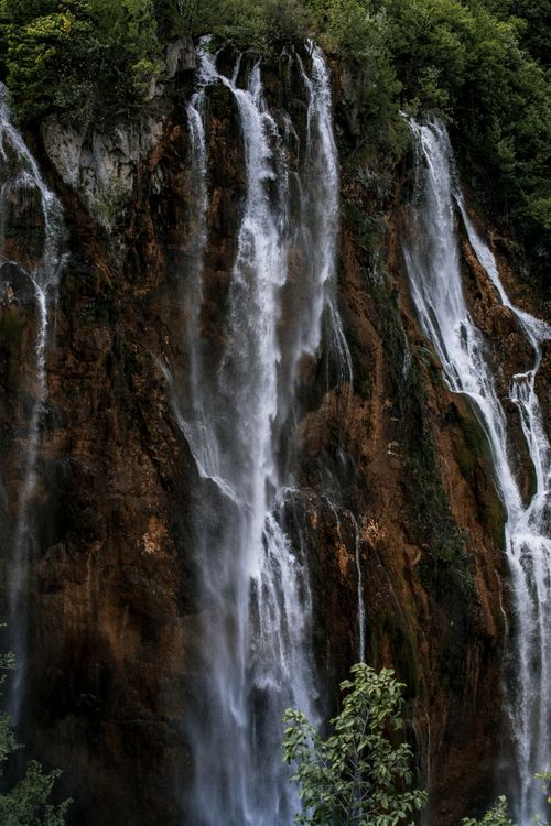 Free Majestic waterfalls cascade in Plitvice Lakes National Park, Croatia, a UNESCO World Heritage Site. Stock Photo