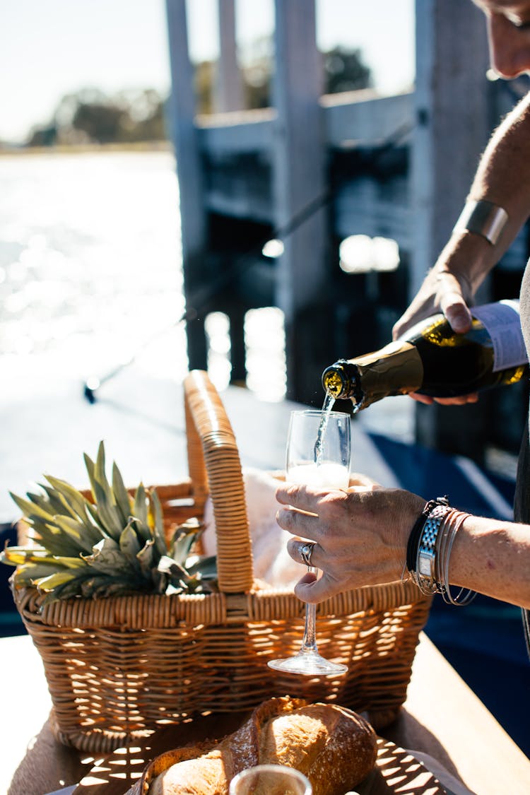 Crop Man Pouring Wine In Glass