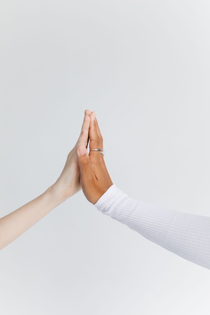 Two hands meeting