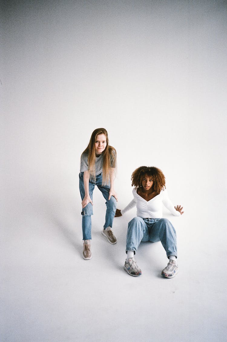 Women Posing In White Background