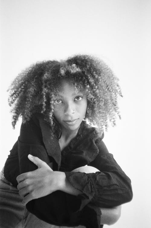 Studio Shot of a Young Woman with Afro Hairstyle 