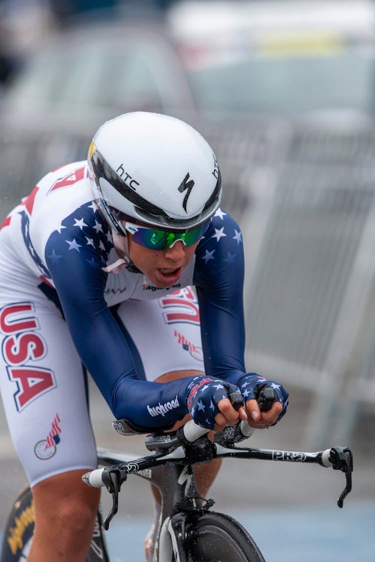 Man Wearing USA Jersey Riding On A Bike 