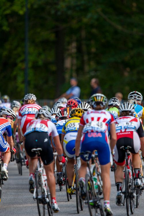 Free Cyclists in a competitive race, showcasing athleticism and teamwork. Stock Photo
