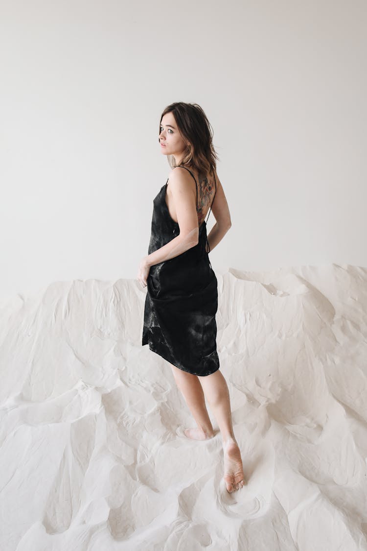 A Woman With Vitiligo Wearing Black Dress 