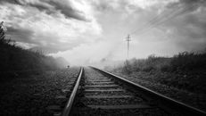 Black and White Photo of a Railway Track