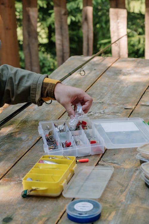 Person Holding Clear Plastic Pack