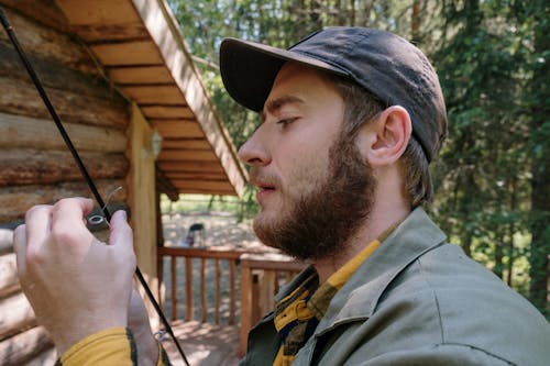 Man in Green Hat and Yellow Shirt