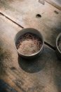White Ceramic Bowl With Brown Liquid