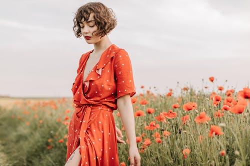 A Woman in Red Polka Dots Dress