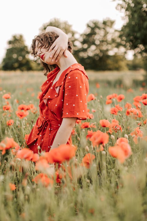 Beautiful Woman in Red Lipstick Posing at The Camera · Free Stock Photo