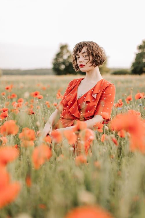 A Woman Posing in the Flower Field