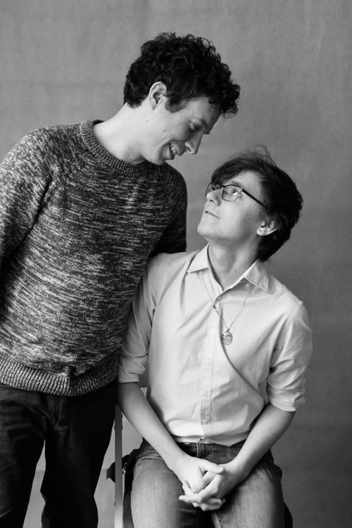 Free A joyful moment captured between a smiling couple in black and white. Stock Photo