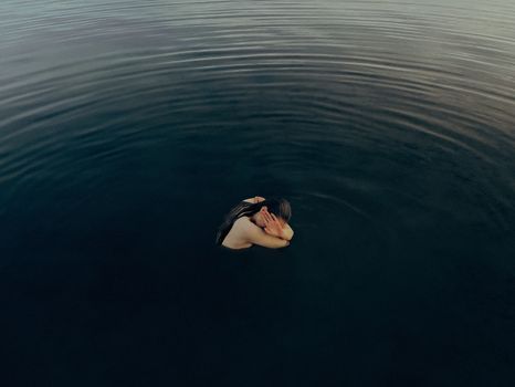 White Swan on Body of Water