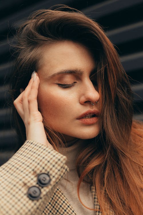 Free Close-Up Shot of a Woman With a Nose Piercing Stock Photo