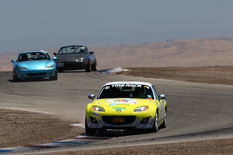 Yellow And White Car On Road