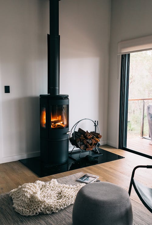 Cozy fireplace in light minimalist living room