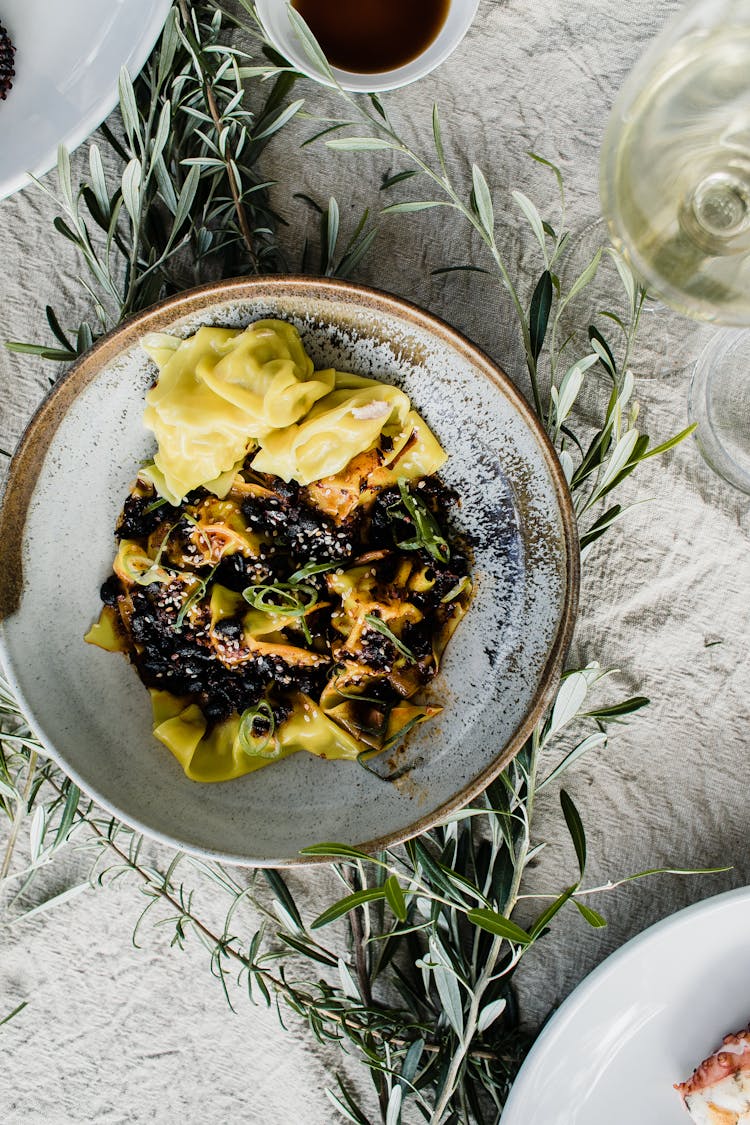 Plate With Delicious Pasta On Table